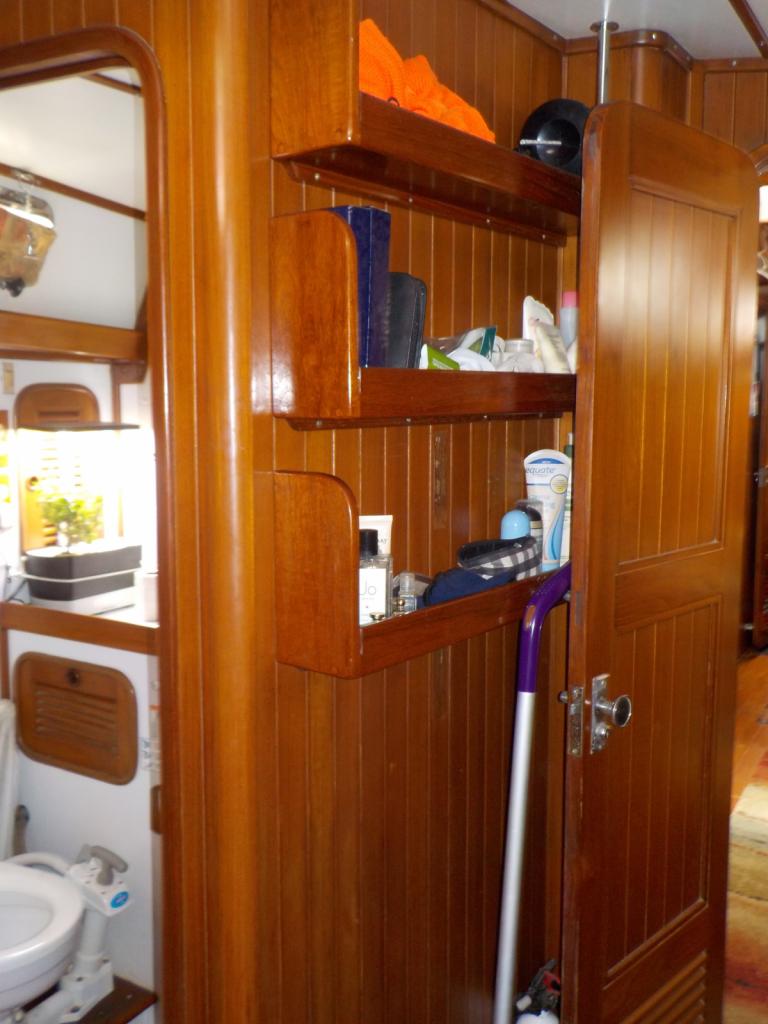 Forward berth shelving and head looking aft.JPG
