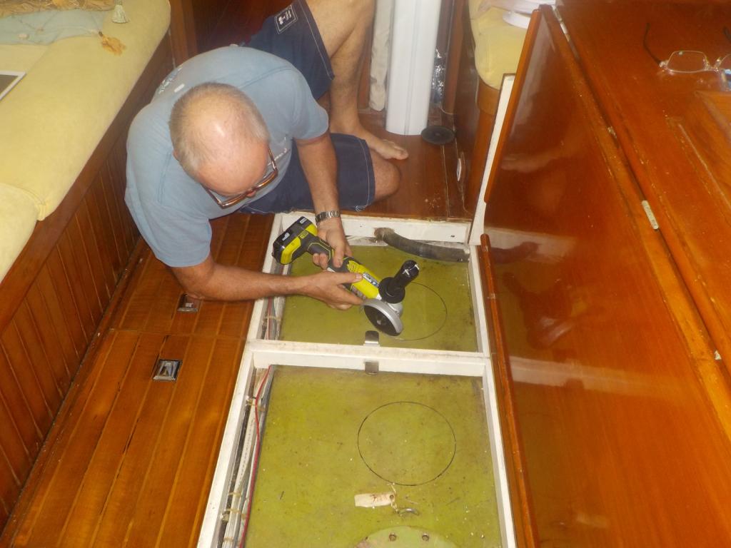4 Cutting holes in the water tank.jpeg