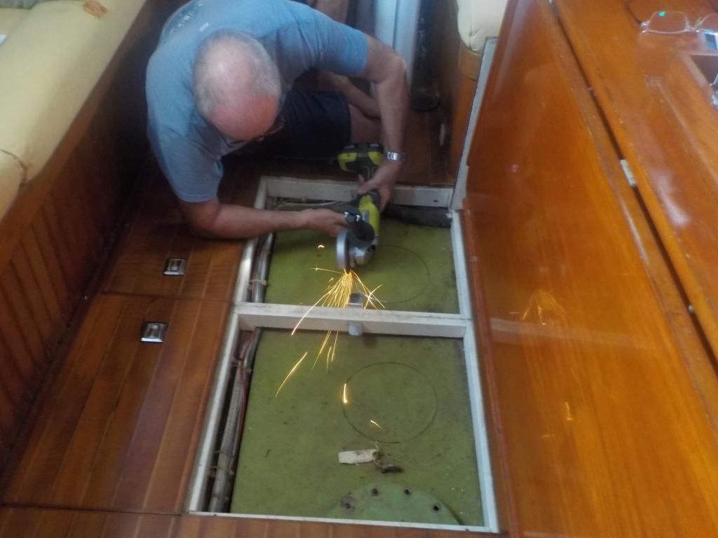 3 Cutting holes in the water tank.jpeg