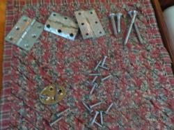 2696Bent and broken hinges from salon table.jpeg