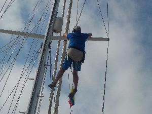 Gerry doing the spreaders up the mast.jpeg