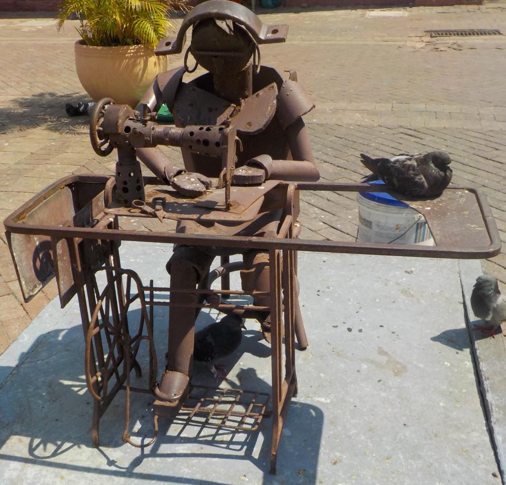 Seamstress by Edgardo Carmon.jpeg