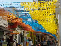 Bunting and umbrellas overhead Getsemani.jpeg