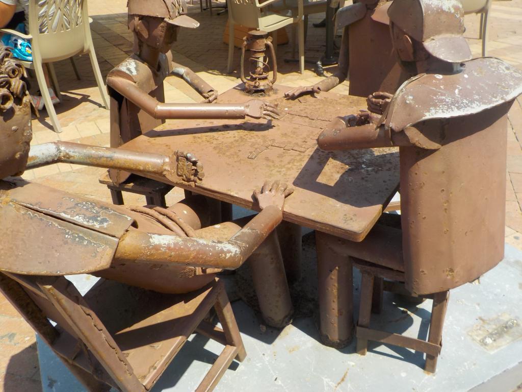 Domino players by Edgardo Carmon.jpeg