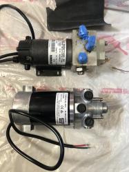 Old and new auto pilot pumps.jpeg