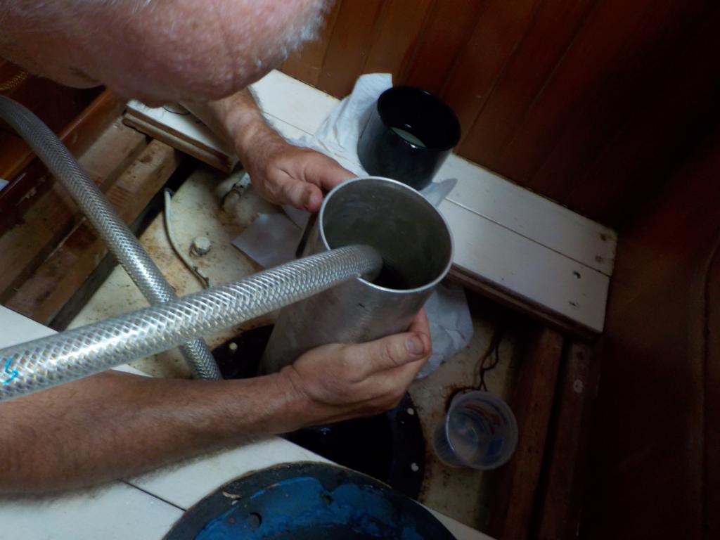 Filtering fuel through the baha filter (1).jpeg